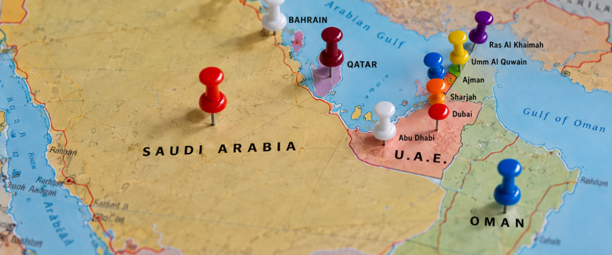 Pushpins Across the Arabian Gulf Map